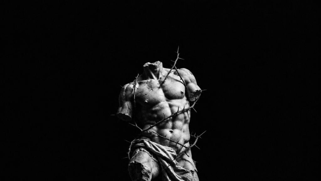 Marble torso bound in thorns